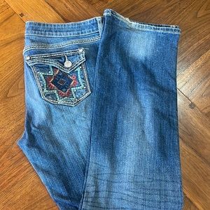 Well loved Wrangler Rock 47 size 15 women’s bootcut jeans.
